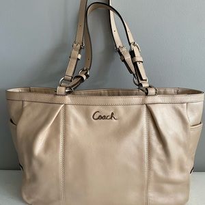Tan leather Coach bag.